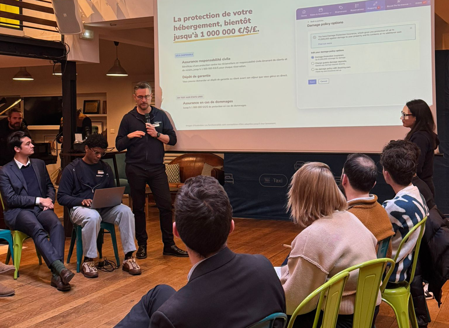 Evan presenting at hospitality event in Paris